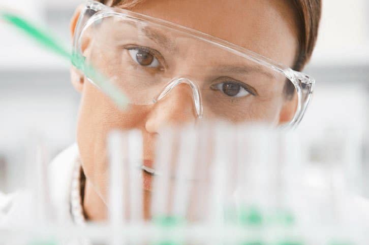 laboratory technician working the the laboratory conducting an experiment