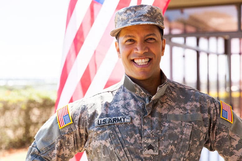 man-in-military-uniform-smiling-at-camera-confident-at-getting-a-job