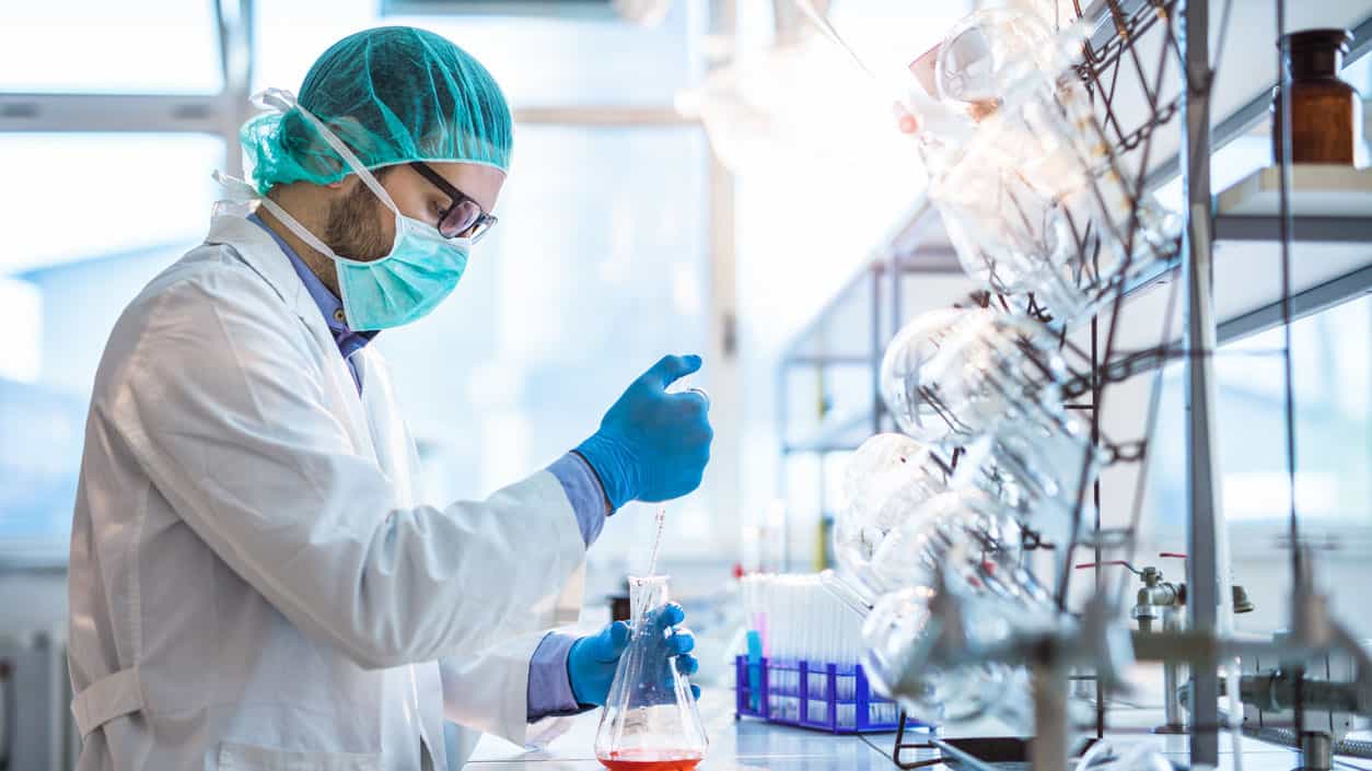 Male biotechnologist testing new chemical substances in a lab